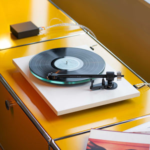 Pro-Ject T2 White On Sideboard